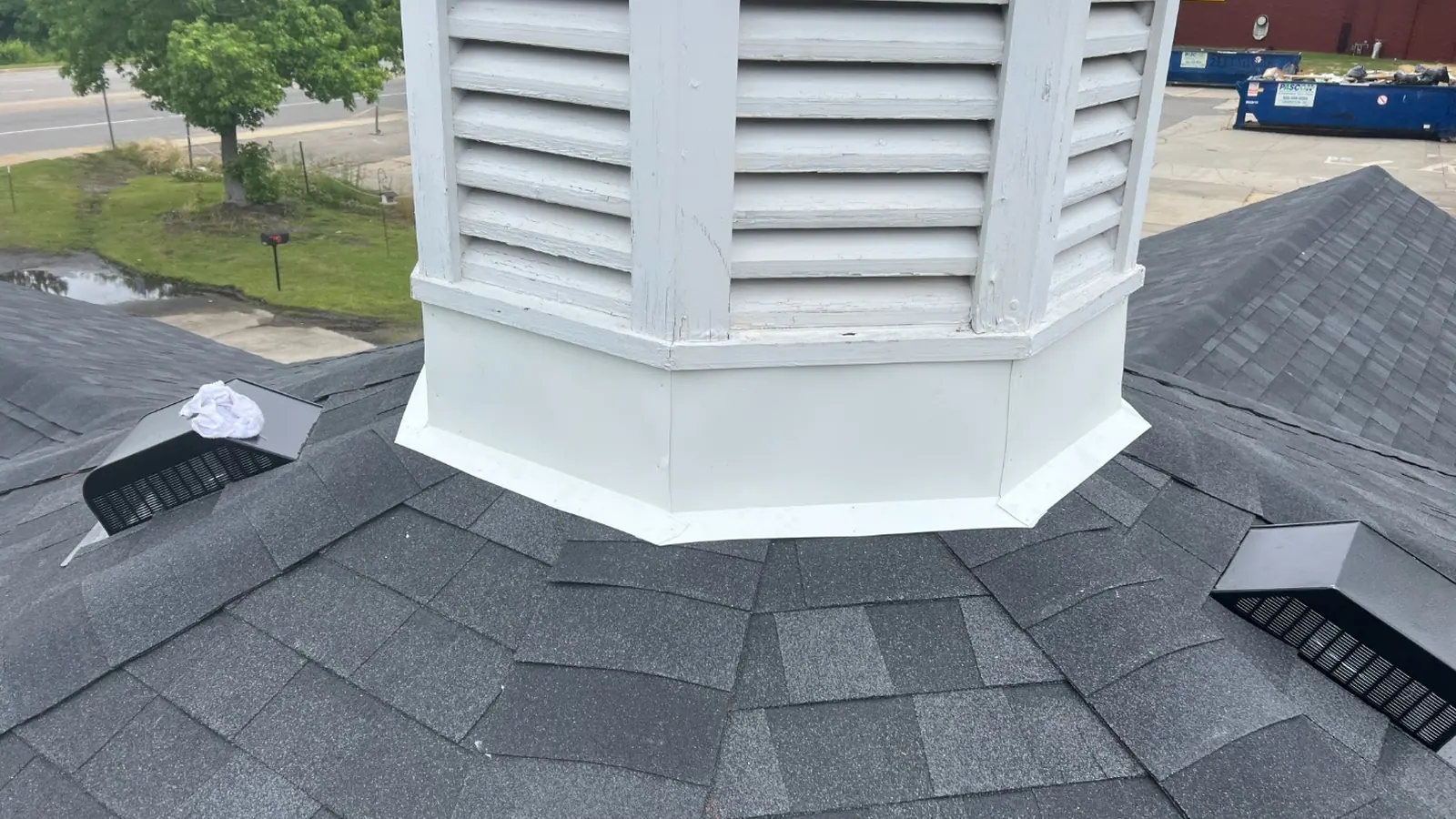 Cupola base flashed and sealed into a newly installed architectural shingle roof