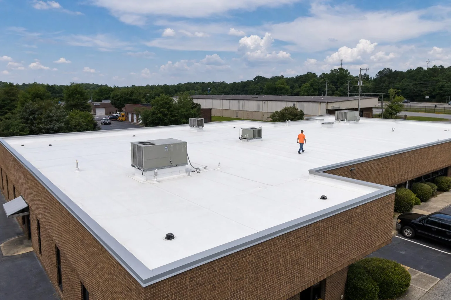 White TPO membrane on a low-slope commercial roof in West Columbia, South Carolina